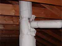 Asbestos covered vent pipe